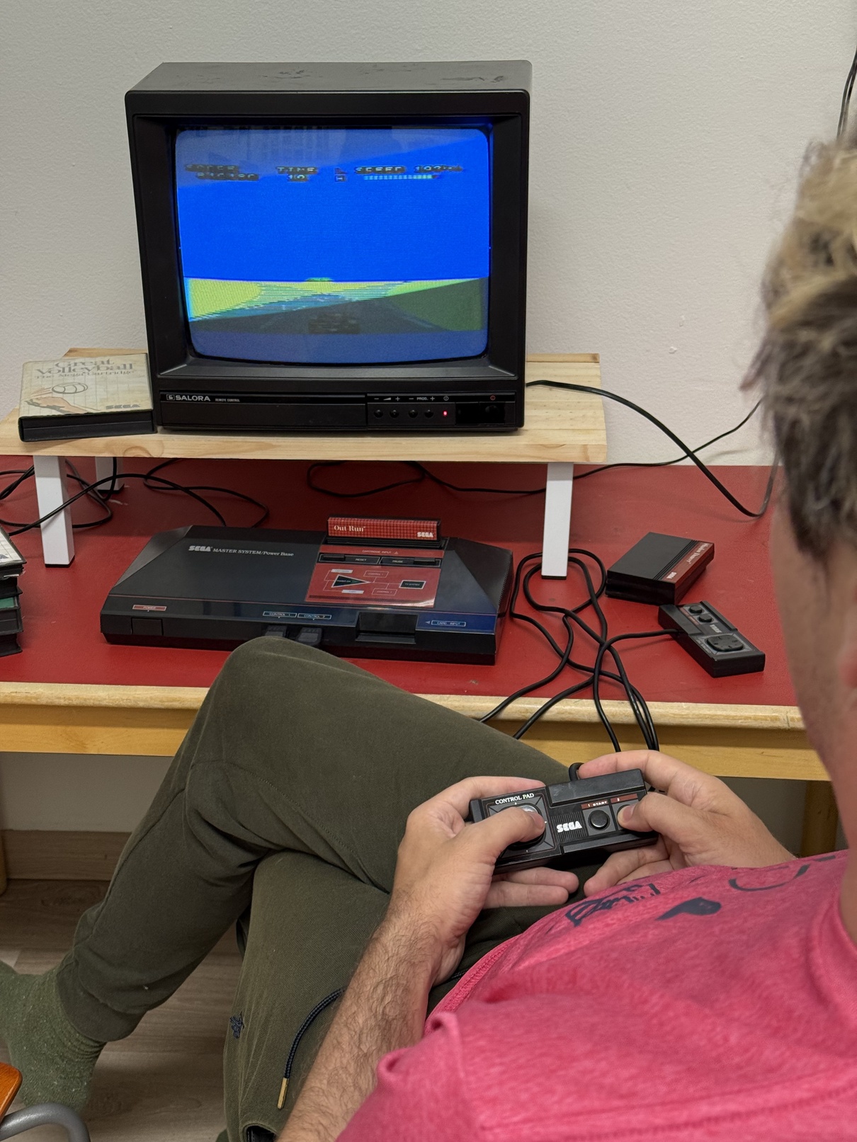 Jeff playing a racing game on master system